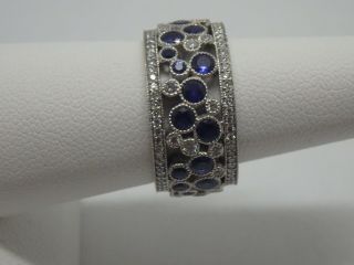 Tiffany & Co.  Platinum,  diamond and blue Sapphire Cobblestone band ring size 5.  5 7