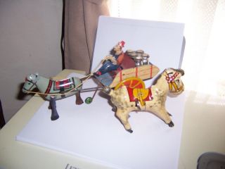 Vintage Tin Toy Windup Hee Haw Farmer And Milk Cart And Wind Up Pony Jiggles 2pc