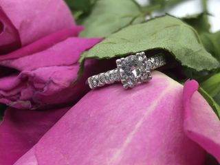 Stunning Art Deco Platinum Engagement Ring With Pretty Shoulders.  75 Point Cente