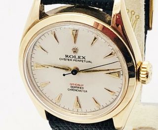 VINTAGE ROLEX 14K GOLD OYSTER PERPETUAL AUTOMATIC WATCH Ref.  6084 C.  ' 51 5