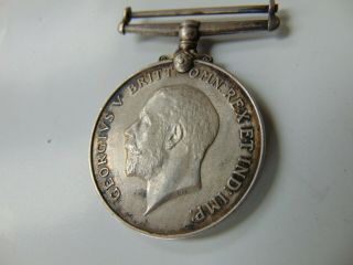 WWI BRITISH WAR SILVER MEDAL GEORGIVS V BRITT.  OMN REX ET IND IMP 1914 1918 capt 4