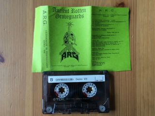 ANCIENT ROTTEN GRAVEYARDS A.  R.  G.  Heathenism in.  DEATH METAL DEMO TAPE CASSETTE 2