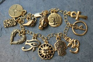 Deluxe Gold Ancient Religions Charm Bracelet - Buddha,  Om,  Hamsa Hand,  Angel Wing