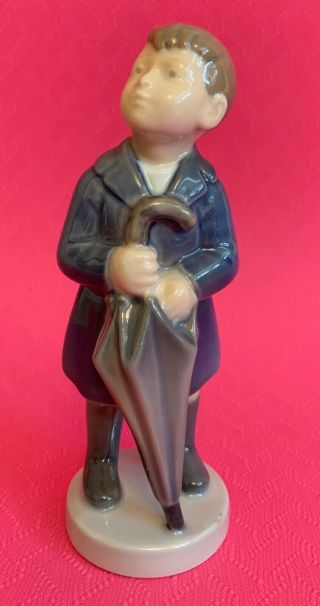 Royal Copenhagen Figurine Boy With An Umbrella 4526