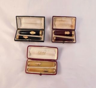 French Antique Amber 18k Gold Rimmed Cigar/cigarette Holders In Cases.  3 Pairs