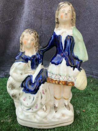 Mid 19thc Staffordshire Scottish Figures With A Large Rabbit C1860s