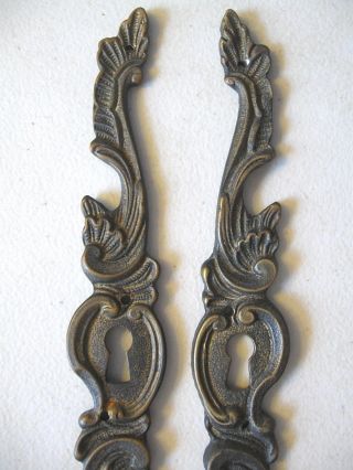 (2) ANTIQUE / VINTAGE - - FURNITURE KEYHOLE DECORATIONS / COVERS - - SOLID BRASS 6