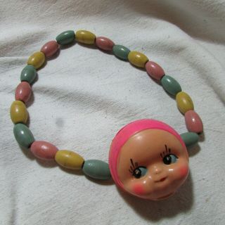 Unusual Cool Vintage Thin Celluloid Baby Doll Head Rattle Toy,  Wood Bead Strand