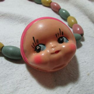 Unusual Cool Vintage Thin Celluloid Baby Doll Head Rattle Toy,  Wood Bead Strand 2