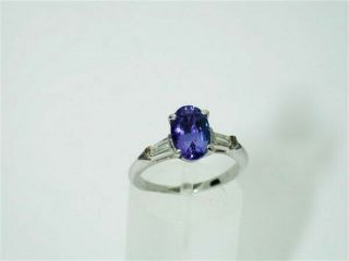 $4,  5000 Antique Platinum Ceylon Sapphire & Baguette Cut Diamond Ring $99
