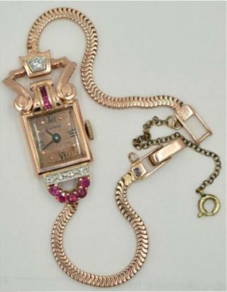 Vintage Ladies Watch In 14 Karat Rose Gold Diamonds And Rubies Ebel Movement