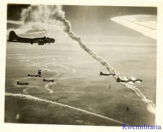 Org.  Photo: Aerial View B - 17 Bombers in Formation Dropping Bombs on Target 2