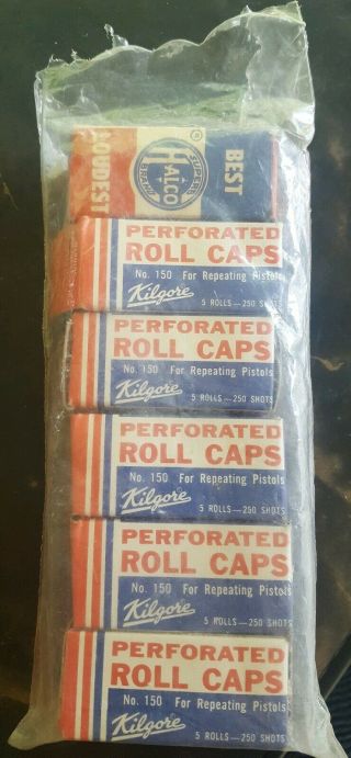 4 Kilgore Perforated Roll Caps No 150,  1 Partial,  1 Halco Paper Caps