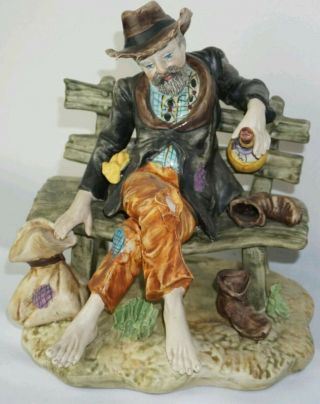 Capodimonte Figurine Tramp On Bench Drinking Wine.  91/2 In.  Tall.  Bought In Italy