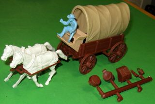 Marx.  Recast.  Dark Brown Covered Wagon With Vintage Powder Blue Driver.