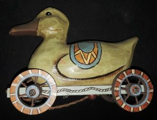 Vintage Hand Carved And Painted Wooden Duck Folk Art Pull Toy On Wheeled Cart.