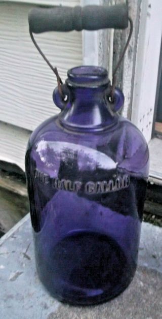 Purple Half Gallon Whiskey Bottle W/handle 1910 