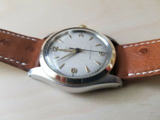 Vintage Tudor Rolex Oyster ref.  7804 fully serviced.  Under.  Rose dial. 3