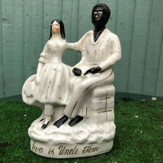Mid 19thc Staffordshire Figurine Group: Blackamoor Uncle Tom & Eva C1850s