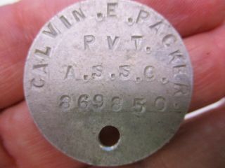U.  S.  Army WWI Metal Identification Tag for Calvin E.  Packer PVT A.  S.  S.  C 3