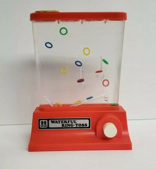 Vintage 1976 Tomy Wonderful Waterfuls Ring Toss Game (red)