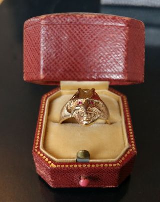 Very rare solid antique gold art deco devil face ring with Ruby eyes.  14 k 2