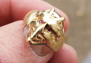 Very rare solid antique gold art deco devil face ring with Ruby eyes.  14 k 4