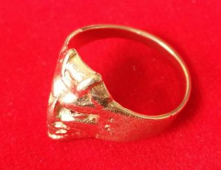 Very rare solid antique gold art deco devil face ring with Ruby eyes.  14 k 9