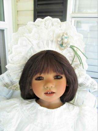 Annette Himstedt SETINA.  Gorgeous Doll and the antique outfit is from Paris 10