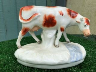 Mid 19thc Staffordshire Porcellaneous Russet Red & White Cow C1860s