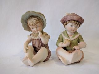 Vintage Pair Andrea Bisque Boy & Girl W/bonnet Piano Doll Figurines 6682 (2)