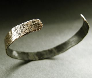 A Ancient Viking Bronze Decorated Bracelet