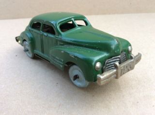 Vintage Japan Wind Up Tin Toy Car,  Ford Sedan,  Forward & Reverse Antique Tin Toy