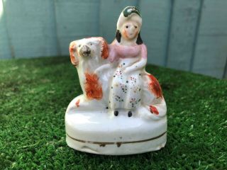 Mid 19thc Staffordshire Figurine Seated On Recumbent Spaniel Dog C1860s