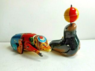 LEHMANN GESCH Tin Windup Toys Sea Lion Tumbling Bear Western Germany 1950s 60s 2