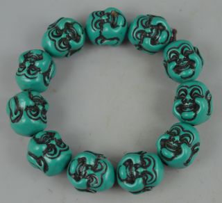 China Handwork Turquoise & Resin Carve Buddha Head Elastic Bracelet Amulet