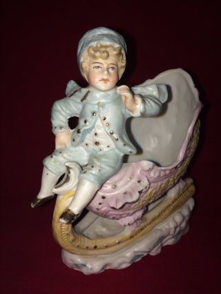 Antique German Bisque Porcelain Boy On Sleigh