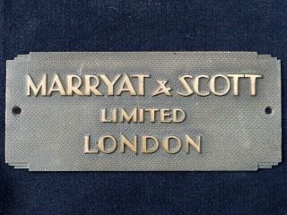 Art Deco Brass Plaque Embossed Marryat & Scott,  London.