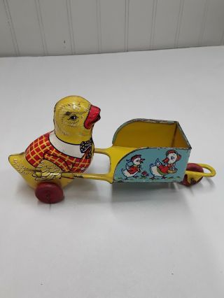 J.  Chein & Co Vintage Tin Toy Easter Chick Pushing Wheelbarrow W/ Wooden Wheels