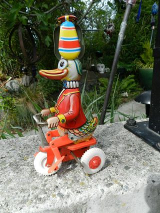 Vintage Tin Litho Wind Up Duck On Bicycle Made In West Germany,  First Generation,