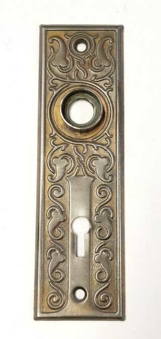 A09 Antique Pressed Metal Ornate Doorknob Backplate 5 1/2 " X 1 5/8 "