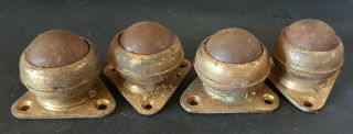 Set Of Four Vintage Brass And Steel Castors For Furniture