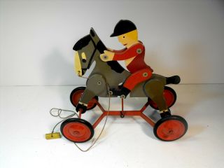 Wooden Jockey On Articulated Horse Pull Toy.  Possible English.