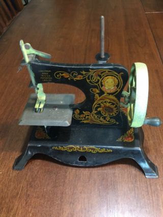 Vintage 1930 Lindstrom Child`s Toy Little Miss Sewing Machine,