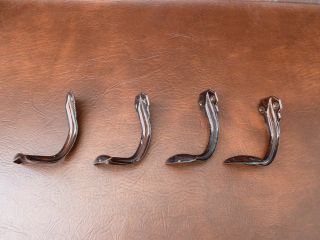 A Set of 4 Vintage French Pressed Steel Coat Hooks School,  Industrial. 4