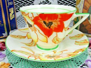 Royal Doulton Deep Orange Enamel Floral Art Deco Tea Cup And Saucer