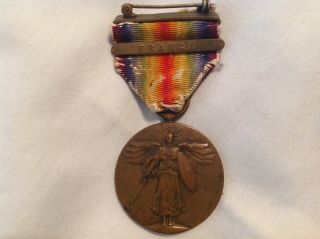 Wwi U.  S.  Victory Medal W/france Bar,  Tarnish And Wear And Age