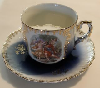 Vintage Large Porcelain Mustache Cup & Saucer Blue Gold Trim W/ Royal Scene