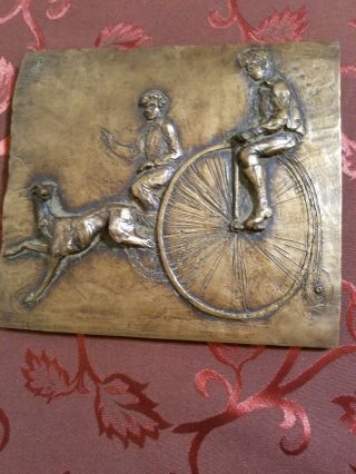 Bronze Relief Plaque - Sculpture Of Two Boys Riding Penny - Farthing Bikes.