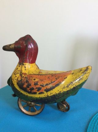 Vintage Tin Duck Pull Toy On Wheels C.  1920 